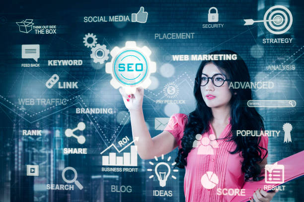 Ahgrl SEO strategy workspace with laptop analytics charts and keyword research tools